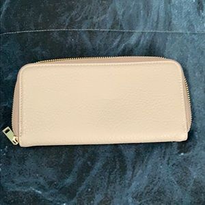 Grey Wallet with brown interior.